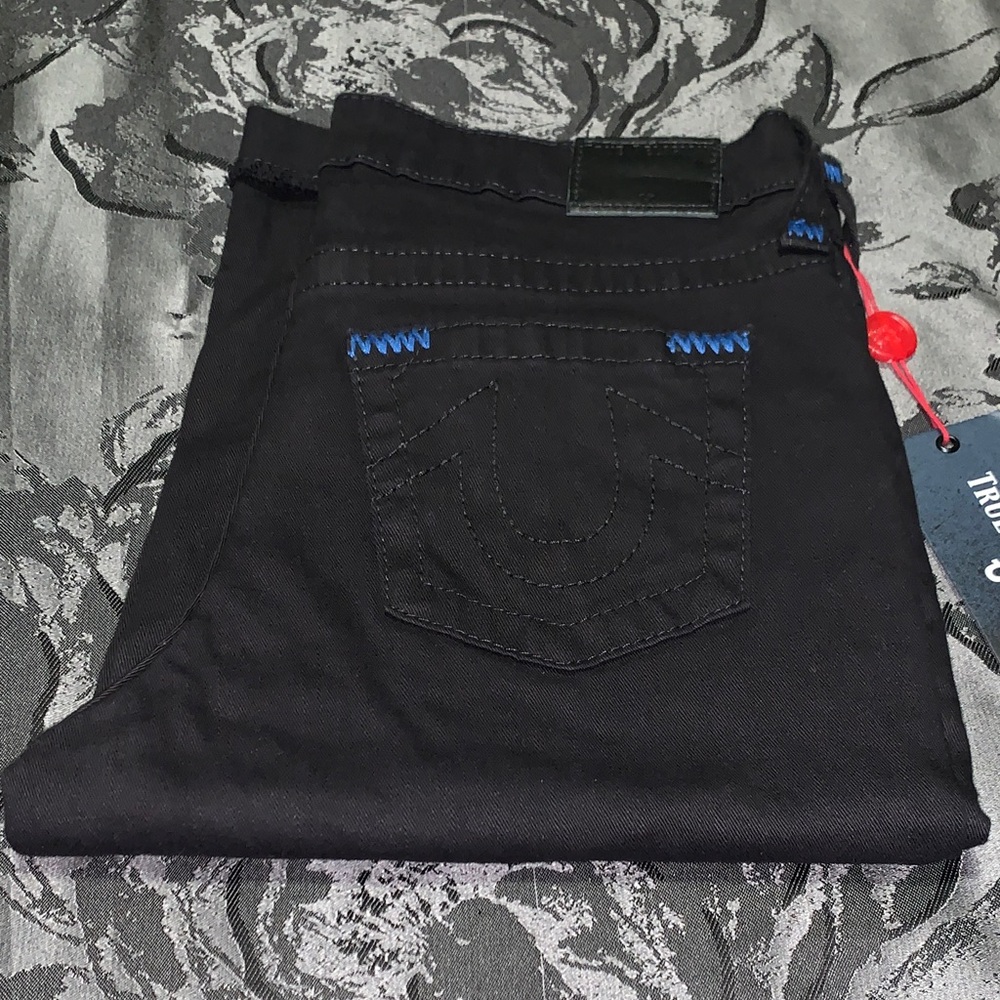 True Religion Brand Jeans TRBJ World Tour Fashion For The Senses